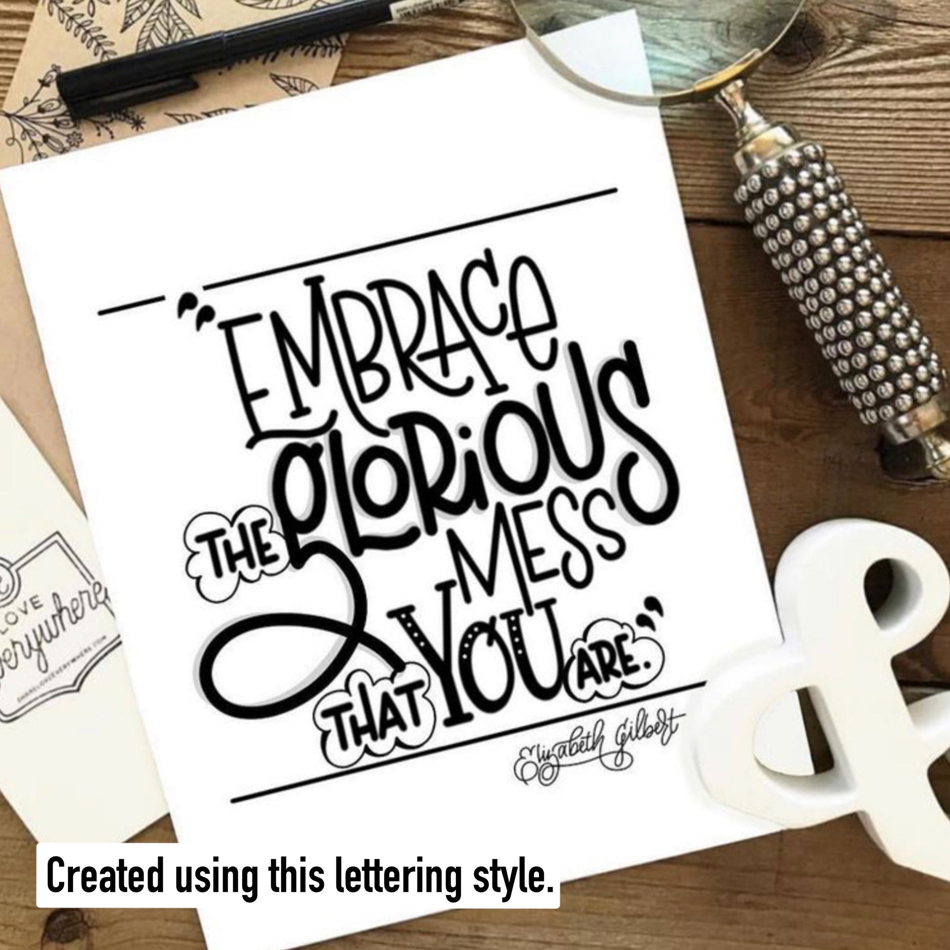 Digital lettering guide open on iPad using Procreate for on-screen tracing and stylus practice