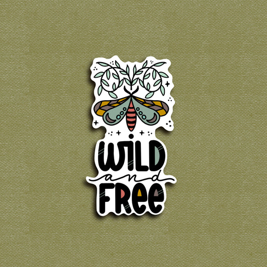 A vinyl decal sticker with an illustration of a moth and the phrase 'WILD AND FREE'.