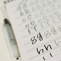 Close-up of alphabet worksheets from hand lettering workbook
